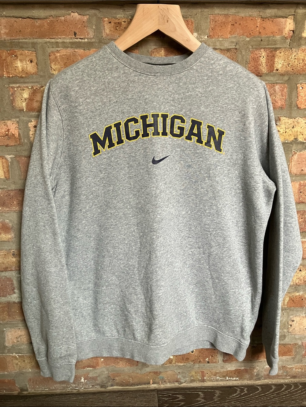 Nike sweatshirt  "MICHIGAN" graphic and a center Swoosh logo